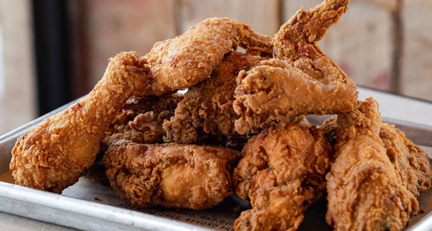 Image of fried chicken stacked on a tray