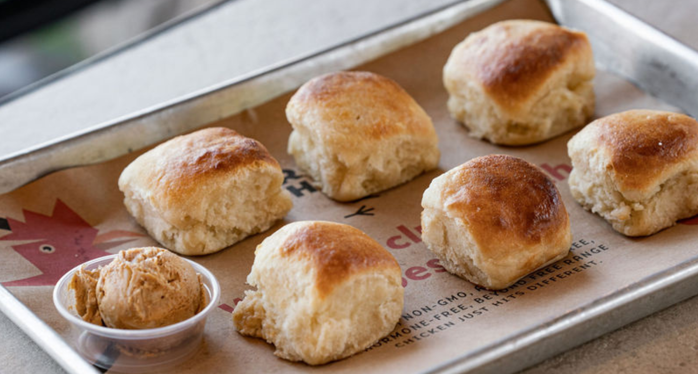 Image of 6 biscuits on a tray with butter