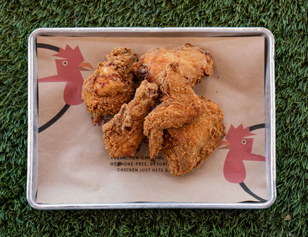 Fried chicken on a tray on turf
